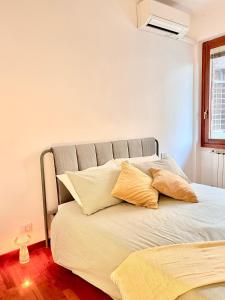 Ένα ή περισσότερα κρεβάτια σε δωμάτιο στο House in Trastevere PortaPortese