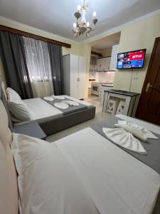 Ένα ή περισσότερα κρεβάτια σε δωμάτιο στο Sota apartment large +1 φωτογραφίες