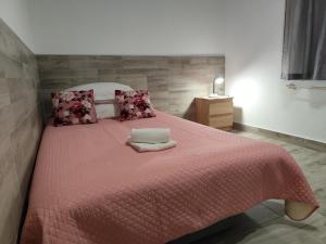 Postel nebo postele na pokoji v ubytování Apartman Nino