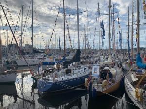 a bunch of boats are docked in a harbor at Paimpol centre tout à pieds avec extérieur ! in Paimpol +6 photos