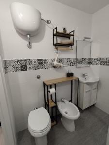 Koupelna v ubytování B&B gli Ombrellini + 8 fotografií