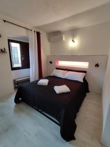 Postel nebo postele na pokoji v ubytování B&B gli Ombrellini