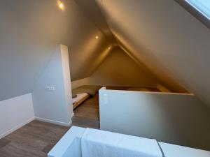 Uma cama ou camas num quarto em Vakantiehuis Coconne