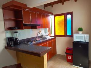 Kuchyň nebo kuchyňský kout v ubytování Apartahotel Balcones de Nariño 2 + 8 fotografií