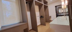 a room with a large window and a glass table at W&P Lakeside Homestay Sri Gading in Sri Gading +28 photos