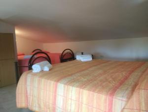 Postel nebo postele na pokoji v ubytování Villa Elena
