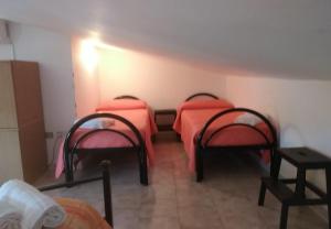 Postel nebo postele na pokoji v ubytování Villa Elena