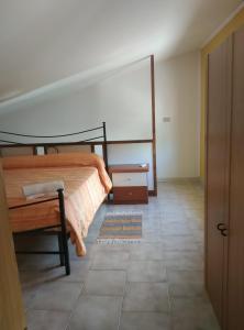 Postel nebo postele na pokoji v ubytování Villa Elena
