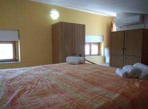 Postel nebo postele na pokoji v ubytování Villa Elena