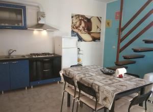 Kuchyň nebo kuchyňský kout v ubytování Villa Elena