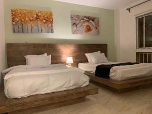 Postel nebo postele na pokoji v ubytování Casa De Madinaty -مدينتي