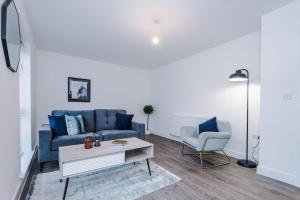 Posezení v ubytování Stylish 3-Bedroom House - BRAND NEW + 57 fotografií