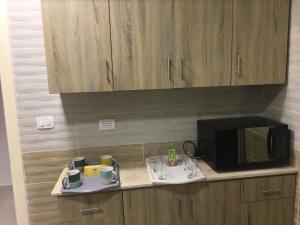 Kuchyň nebo kuchyňský kout v ubytování Casa De Madinaty -مدينتي