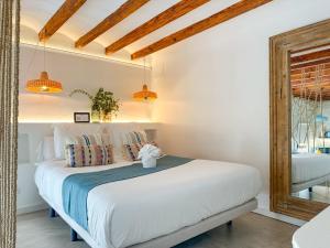 Postel nebo postele na pokoji v ubytování Moona Hostal Altea