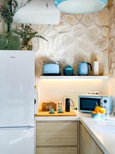 Kuchyň nebo kuchyňský kout v ubytování Moona Hostal Altea