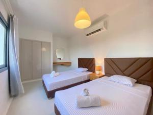 Ένα ή περισσότερα κρεβάτια σε δωμάτιο στο Hotel apartment swan lake +31 φωτογραφίες