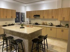 Kuchyň nebo kuchyňský kout v ubytování appartement à oujda