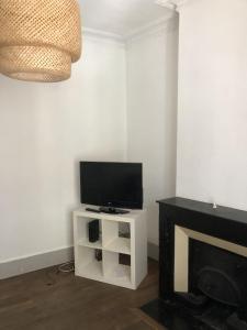 TV a/nebo společenská místnost v ubytování Rent4night Grenoble Aigle