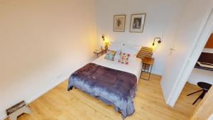 Una cama o camas en una habitación de Le Saint Martin - Appartement moderne - Duplex - Centre ville - Gare