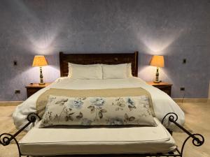 Postel nebo postele na pokoji v ubytování Macarena Guest House