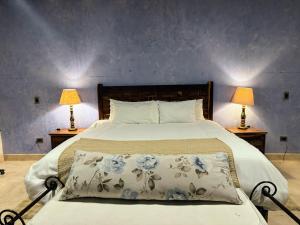 Postel nebo postele na pokoji v ubytování Macarena Guest House