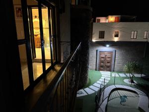 Balkón nebo terasa v ubytování Macarena Guest House