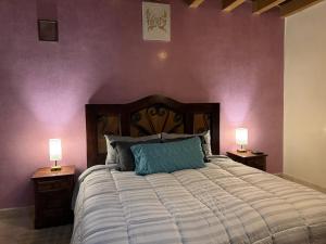 Postel nebo postele na pokoji v ubytování Macarena Guest House