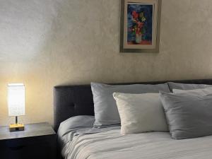 Postel nebo postele na pokoji v ubytování Macarena Guest House