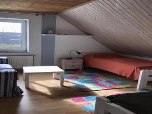 Ein Bett oder Betten in einem Zimmer der Unterkunft Holiday Home in Butjadingen near Wadden Sea