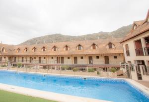 Bazén v ubytovaní Duplex El Refugio de La Bolera alebo v jeho blízkosti