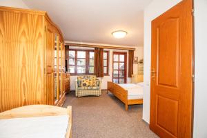 Postel nebo postele na pokoji v ubytování Resort U Jelena