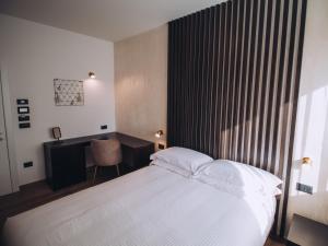 Postel nebo postele na pokoji v ubytování SambuRoom B&B