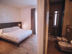 Postel nebo postele na pokoji v ubytování SambuRoom B&B + 37 fotografií