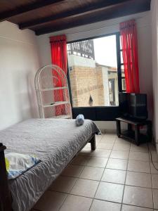 Postel nebo postele na pokoji v ubytování Hotel Campestre Casa Jaz