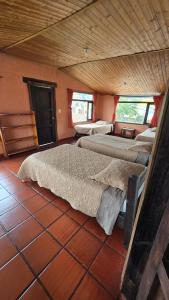 Postel nebo postele na pokoji v ubytování Hotel Campestre Casa Jaz