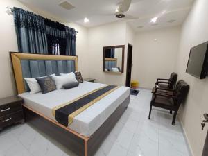 Φωτογραφία από το άλμπουμ του Grace one hotel στη Λαχόρη +9 φωτογραφίες