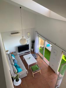 Posezení v ubytování Bohemian Penthouse in Alcaidesa