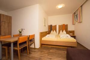 Posteľ alebo postele v izbe v ubytovaní Appartement Alpenfex