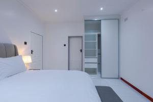 Ένα ή περισσότερα κρεβάτια σε δωμάτιο στο Melz Apartments