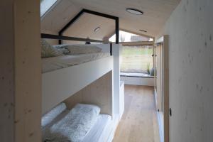Postel nebo postele na pokoji v ubytování Tiny House im Allgäu