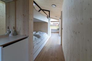 Postel nebo postele na pokoji v ubytování Tiny House im Allgäu