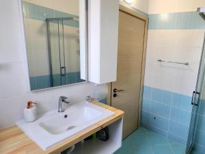 Ванная комната в Avalona Apartment 2 +10 фотографий