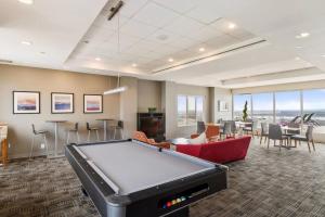a billiard room with a pool table in the middle at Prime Location for Business Stay in Arlington +18 photos