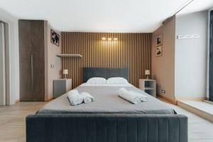 A bed or beds in a room at Catanese Proverb's House - Via Napoli - Ground Floor