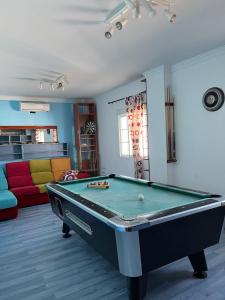 a living room with a pool table in it at Chalet Grande Margarita, 75 in El Puerto de Santa María