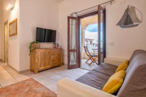 Μια τηλεόραση ή/και κέντρο ψυχαγωγίας στο Boutique Apartments San Teodoro Center