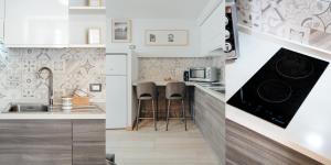 A kitchen or kitchenette at Catanese Proverb's House - Via Napoli - Ground Floor
