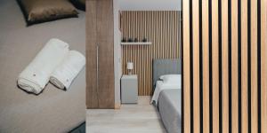 A bed or beds in a room at Catanese Proverb's House - Via Napoli - Ground Floor