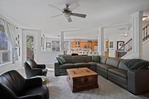 a living room with a couch and a table at Flagline Trail in Bend
