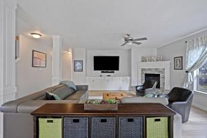 a living room with a couch and a table at Flagline Trail in Bend